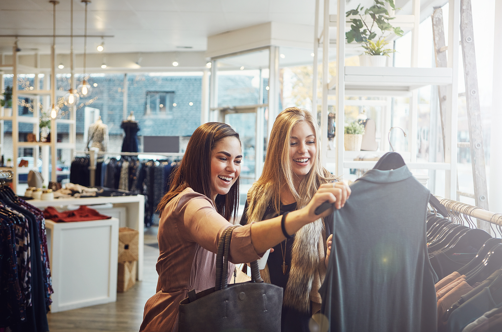 two women shopping for clothes